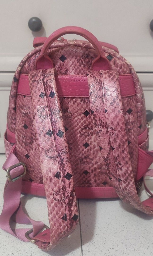 MCM Studded Pink Backpack Medium (Category: Backpacks) located in Pasig City. Submitted by xcess_baggage (Listing ID 1466884480, Image 3). Description: flaws shown in photos..