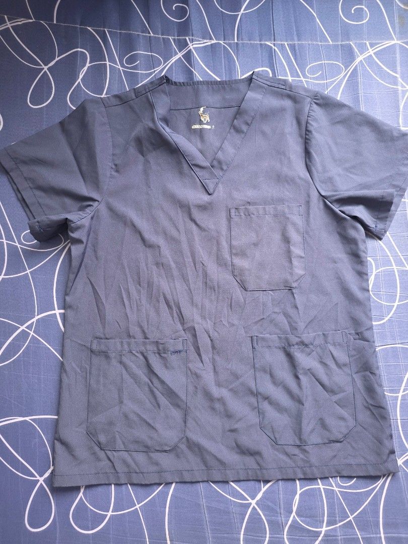 medical scrubs set top and pants (Category: Sets or Coordinates) located in Taguig. Submitted by min3rvaaaa (Listing ID 1466815021, Image 2). Description: - Color: Dark blue - Top: V-neck with 3 convenient front pockets - Pants: Elastic waistband with white drawstring closure - Material: Soft, durable, and easy-to-wash fabric - Ideal for: Nurses, doctors, and healthcare professionals - Used it for almost 2 months only (internship) ✅️ Price: 350 e
