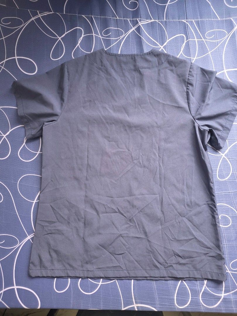 medical scrubs set top and pants (Category: Sets or Coordinates) located in Taguig. Submitted by min3rvaaaa (Listing ID 1466815021, Image 3). Description: - Color: Dark blue - Top: V-neck with 3 convenient front pockets - Pants: Elastic waistband with white drawstring closure - Material: Soft, durable, and easy-to-wash fabric - Ideal for: Nurses, doctors, and healthcare professionals - Used it for almost 2 months only (internship) ✅️ Price: 350 e