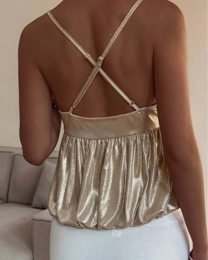 Metallic Gold Spaghetti Strap Bubble Top (Category: Sleeveless) located in Quezon City. Submitted by samxg (Listing ID 1466921456, Image 2). Description: LP 460 Stretchable bubble top; with shimmers > adjustable straps > never worn perf for parties! .