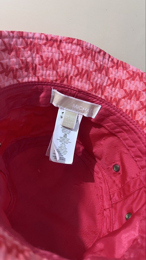Michael Kors Bucket Hat (Category: Hats & Beanies) located in Caloocan City. Submitted by yhanggirl (Listing ID 1466829141, Image 3). Description: Selling my MK Bucket Hat used only once 10/10 condition almost new :) .