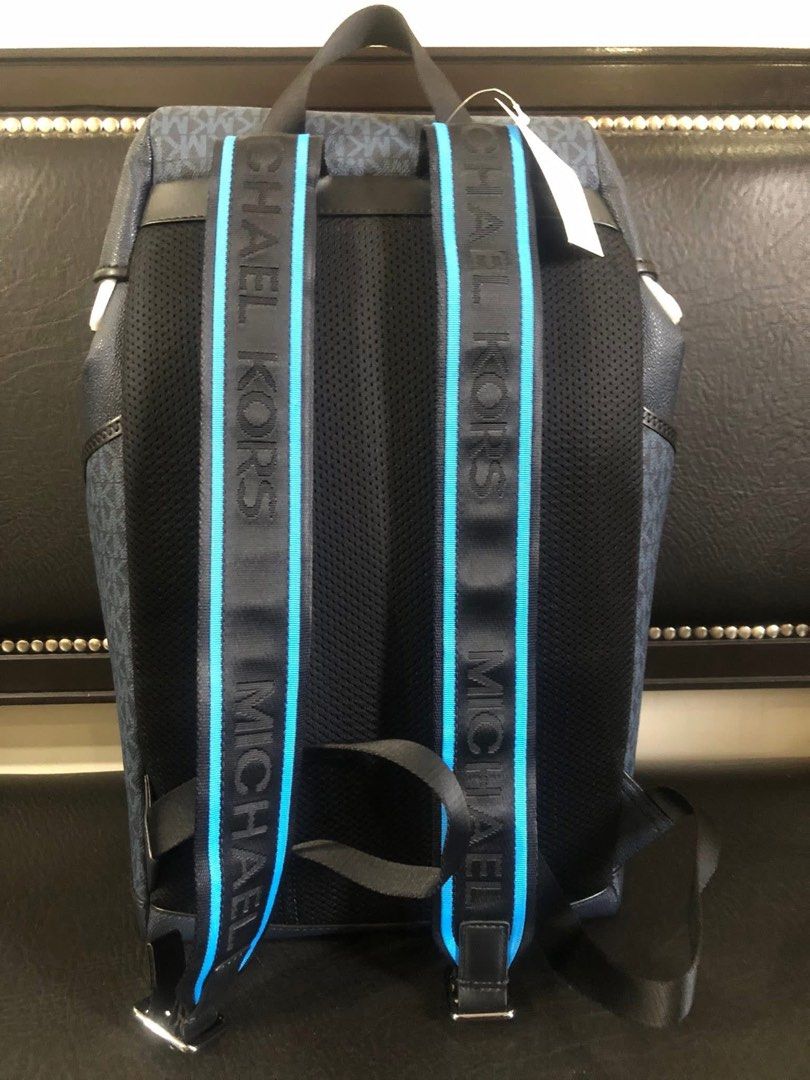 Michael Kors Cooper Sport Flap Backpack Blue (Category: Backpacks) located in Magalang. Submitted by jamiealdana1 (Listing ID 1466903035, Image 2). Description: - 100% Authentic Michael Kors Cooper Sport flap backpack - Blue mini MK logo PVC with a striking blue stripe design - Secure flap closure with buckle hardware and front zip pocket - Adjustable shoulder straps featuring signature Michael Kors lettering - Protective paper wraps still intact