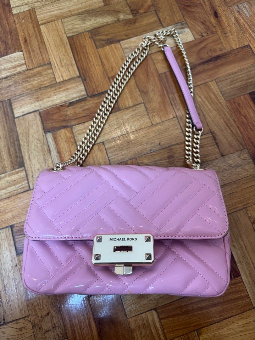 Michael Kors Medium Peyton Pink Quilted Patent Shoulder Bag (Category: Luxury Bags & Wallets) located in Quezon City. Submitted by jfr22 (Listing ID 1466777816, Image 1). Description: - Brand: Michael Kors (Medium Peyton model) - Material: Pink quilted patent leather - Hardware: Bright, clean gold-tone chain strap with leather guard & gold front lock closure - Interior: Signature logo fabric lining with multiple compartments, zippered pockets, an