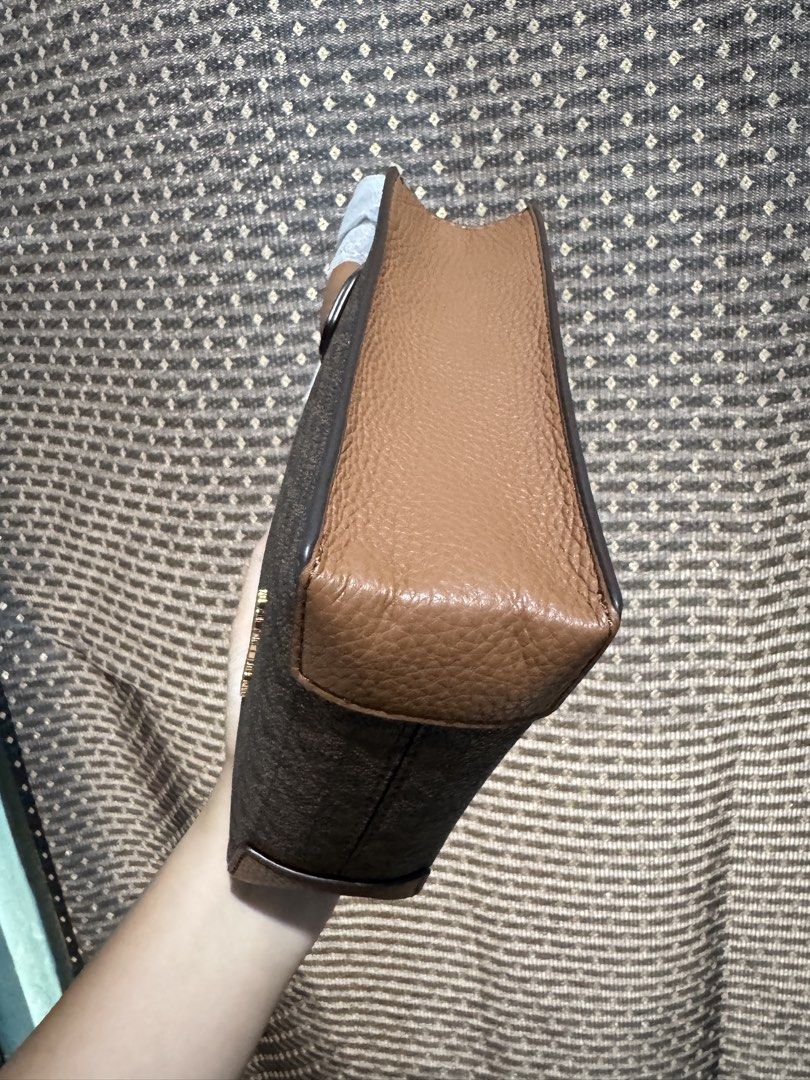 Michael Kors Mercer Extra Small Bag (Category: Cross-body Bags) located in Bulacan. Submitted by cheeryfatima (Listing ID 1466923246, Image 2). Description: FOR SALE: Michael Kors Mercer Extra-Small Crossbody Bag 🤎 • Color: Brown Signature Logo • Style: 35T1GM9C0I • Brand-new • Unused, with original tags and packaging • Includes adjustable long strap • Compact, classy, and perfect for everyday use Please note: The bag does not have the snap clos
