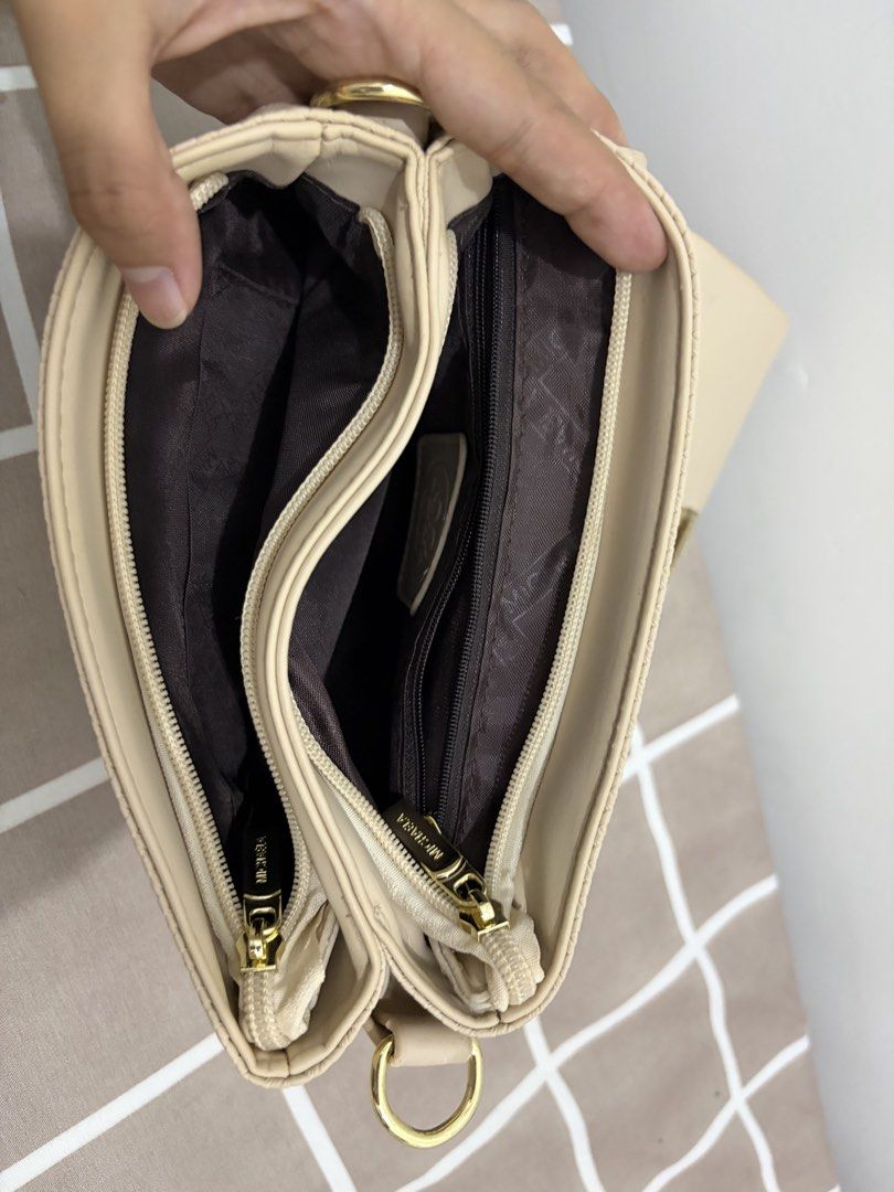 MICHAELA Beige Shoulder Crossbody Bag (Category: Cross-body Bags) located in Los Banos. Submitted by _bugsssbunny (Listing ID 1466879134, Image 3). Description: - Brand: MICHAELA - Color: Neutral beige - Closure: Front flap with elegant gold-tone hardware - Design: Stylish textured woven pattern on the lower body - Compartments: Multiple zippered compartments inside plus a convenient back pocket - Strap: Includes an adjustable and detachable stra