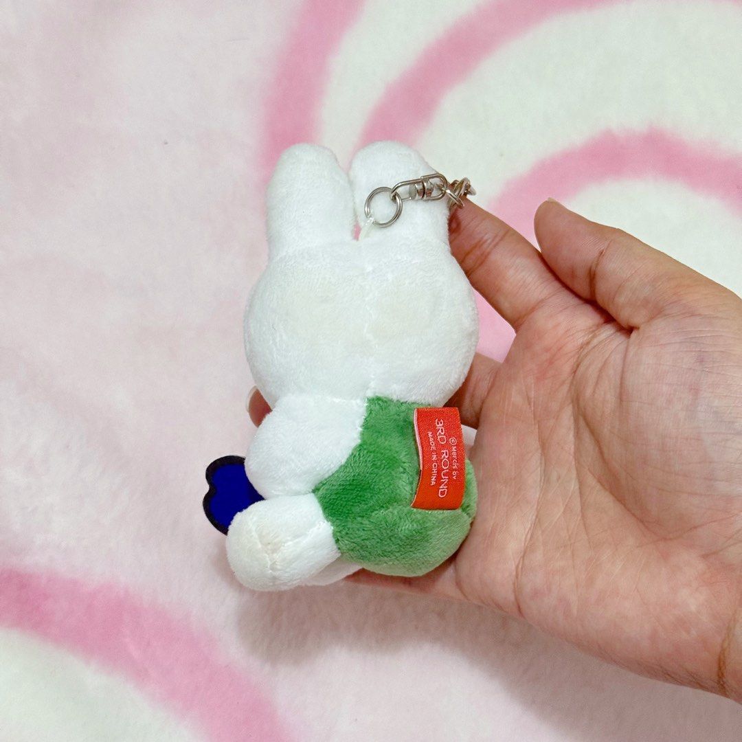 Miffy Green holding flower Keychain Plush (Category: Plushies & Soft Toys) located in Manila. Submitted by ashyyel_ (Listing ID 1466841102, Image 3). Description: .