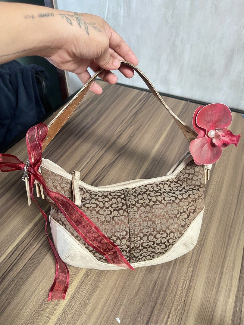 Mini soho (Category: Luxury Bags & Wallets) located in Puerto Princesa. Submitted by madeline.bags (Listing ID 1466775039, Image 1). Description: Vintage Coach Soho Mini Signature Hobo Bag (Style 6351) in a brown and khaki signature jacquard canvas with white leather trim..