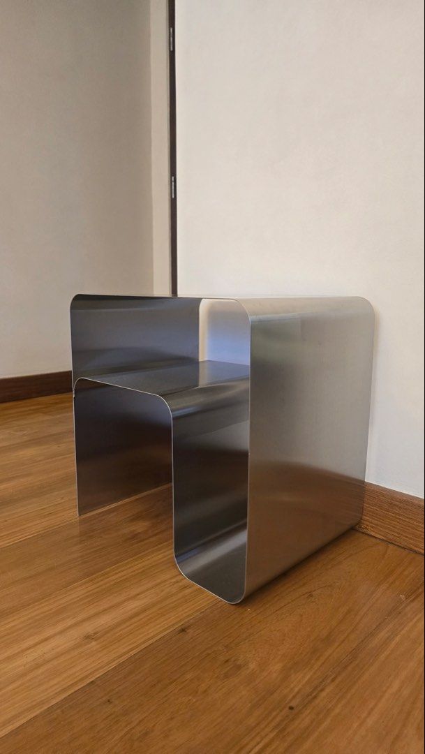 Minimalist Stainless Steel Nested Side Table Modern Design (Category: Tables & Sets) located in Mandaluyong City. Submitted by justinb2007 (Listing ID 1466853113, Image 2). Description: price 9K LP this is brand new stainless steel location mandaluyong - Sleek stainless steel side table with a minimalist curved design - Built-in nested shelf provides extra storage and display space - Clean brushed metallic finish suits modern, industrial, or cont