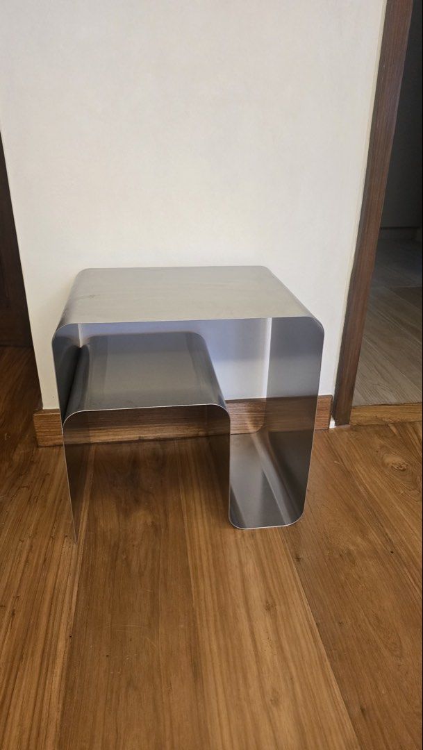 Minimalist Stainless Steel Nested Side Table Modern Design (Category: Tables & Sets) located in Mandaluyong City. Submitted by justinb2007 (Listing ID 1466853113, Image 3). Description: price 9K LP this is brand new stainless steel location mandaluyong - Sleek stainless steel side table with a minimalist curved design - Built-in nested shelf provides extra storage and display space - Clean brushed metallic finish suits modern, industrial, or cont