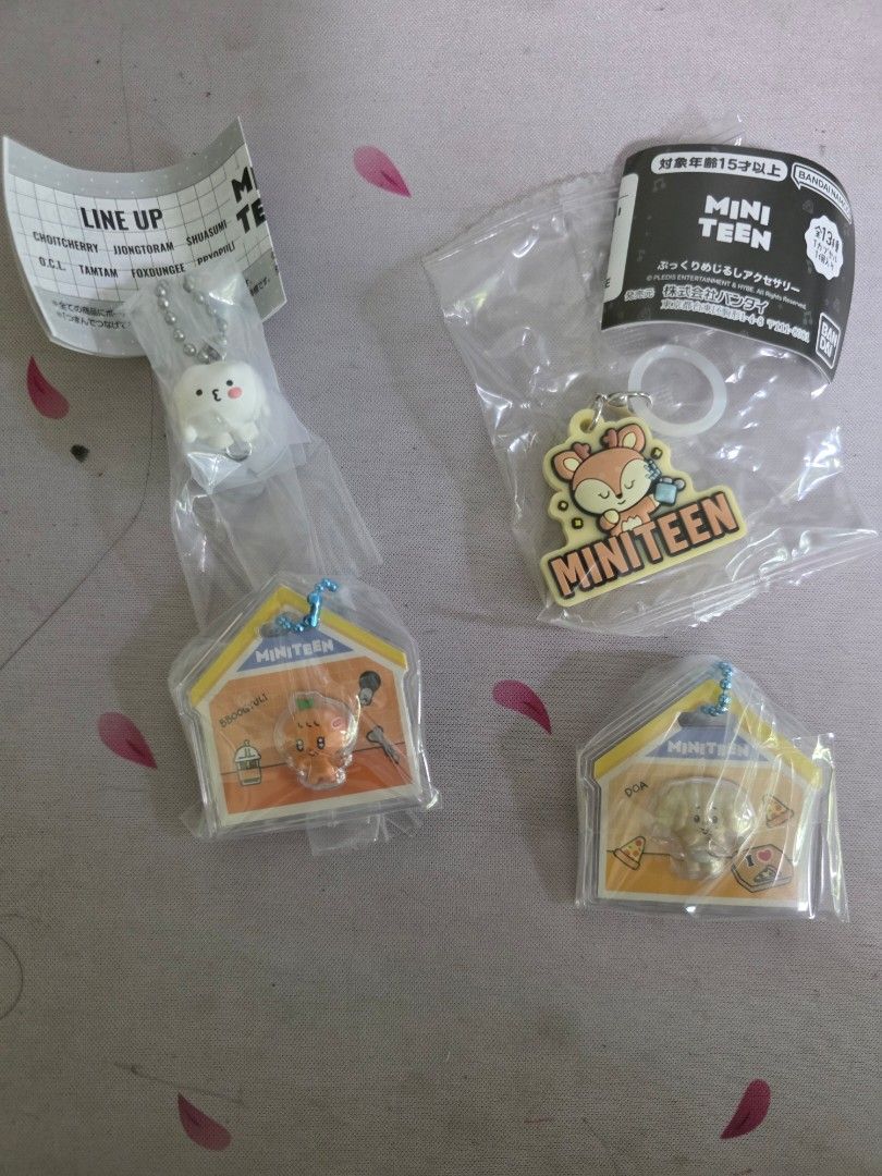 Miniteen Bandai Collab (Category: Character Goods) located in San Juan City. Submitted by pea_17 (Listing ID 1466800700, Image 1). Description: - Official Bandai Namco Miniteen gachapon merchandise - Brand new Shuasumi rubber keyring - 180 Poppyuli keychain with ball chain - 260 Doa, Boogyuli in miniature houses - with gummies (200 each) - Cute addition to any Miniteen or K-pop collector's display .