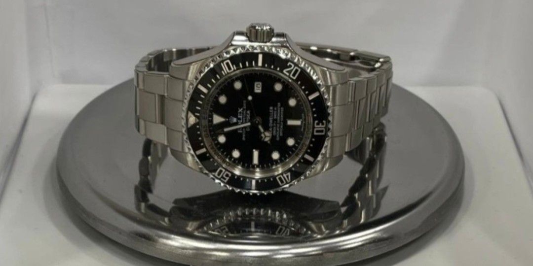 Mint Rolex Sea Dweller Deepsea Oyster 116660 Black Dial Z28464 Mar 2015 (Category: Watches) located in Singapore. Submitted by sssmmm76 (Listing ID 1461476641, Image 2). Description: Brand: Rolex - Model: 116660 - Condition: Mint - Dial: Black - Case Diameter: 44mm - Material: Stainless Steel - Original Box: Yes - Original Cert/Papers: Yes - Dated: Mar 2015 - Warranty: 1 Year Warranty By Service Center in Singapore - Remarks: With new RX8 watch p