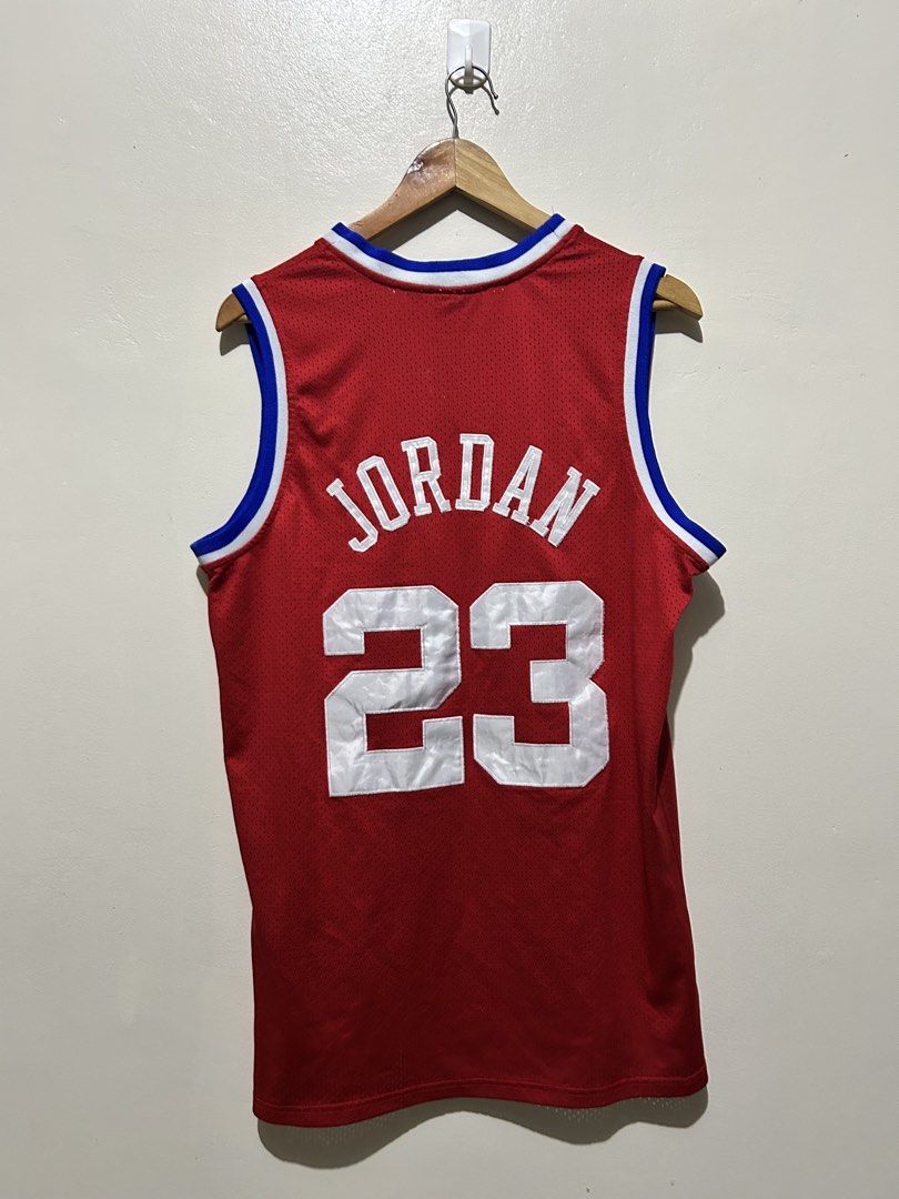 Mitchell & Ness Michael Jordan 1989 All-Star Jersey (Category: Activewear) located in Angeles City. Submitted by johngamboa (Listing ID 1466961936, Image 2). Description: - Brand: Mitchell & Ness Hardwood Classics - Edition: 1989 NBA All-Star - Player: Michael Jordan (#23 on front and back) - Color: Vibrant red with white and blue trim - Details: Embroidered stars down both sides, NBA logo patch on upper chest - Ideal for: Collectors and casual s