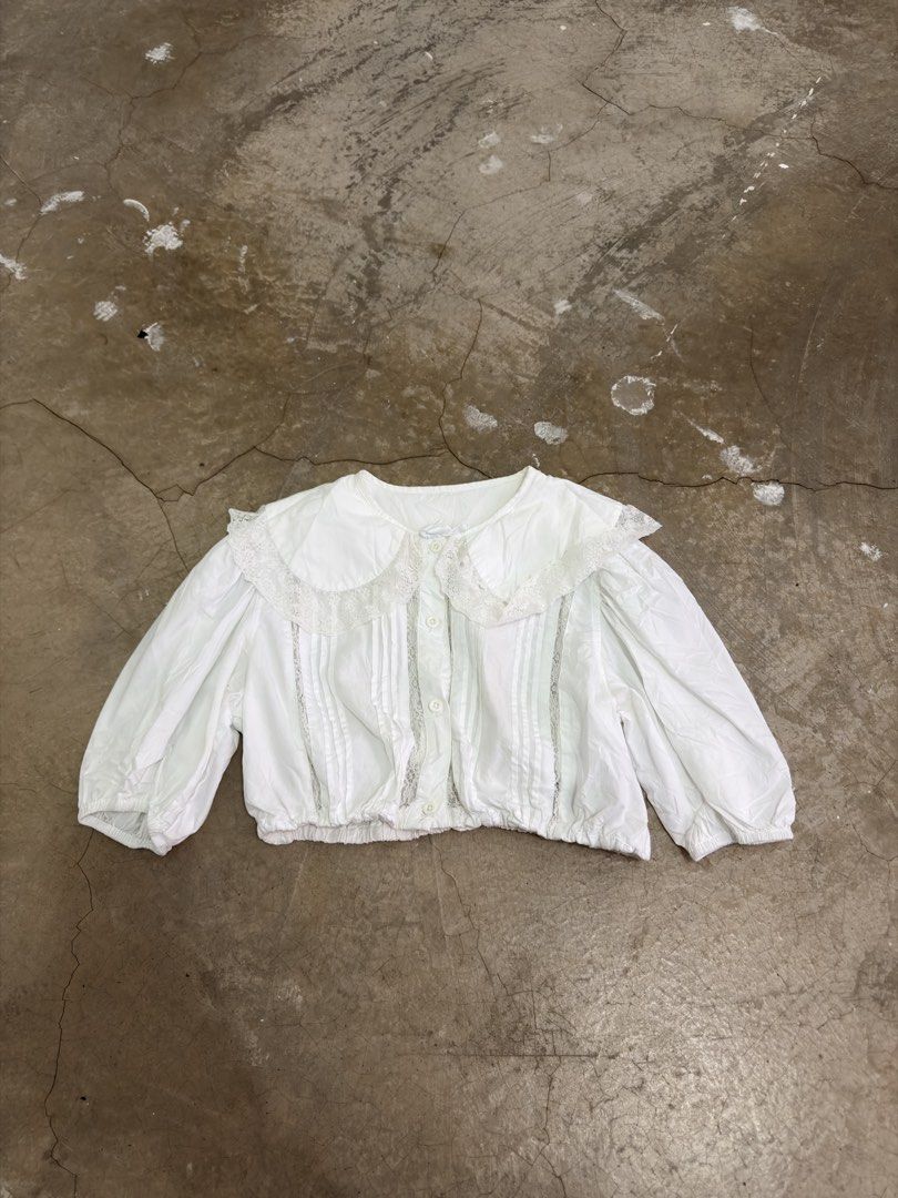 Miu Miu White Cotton Lace top (Category: Luxury Apparel) located in Alfonso. Submitted by jbcamet (Listing ID 1466879744, Image 2). Description: - Brand: Miu Miu - Origin: Made in Italy - Size: 36 - Material: 100% Cotton - Details: Delicate lace paneling with elasticated gathering - Care: Cold hand wash inside out - Authenticity: Includes official tag with QR code and NFC chip (RN 98339, CA 34767).
