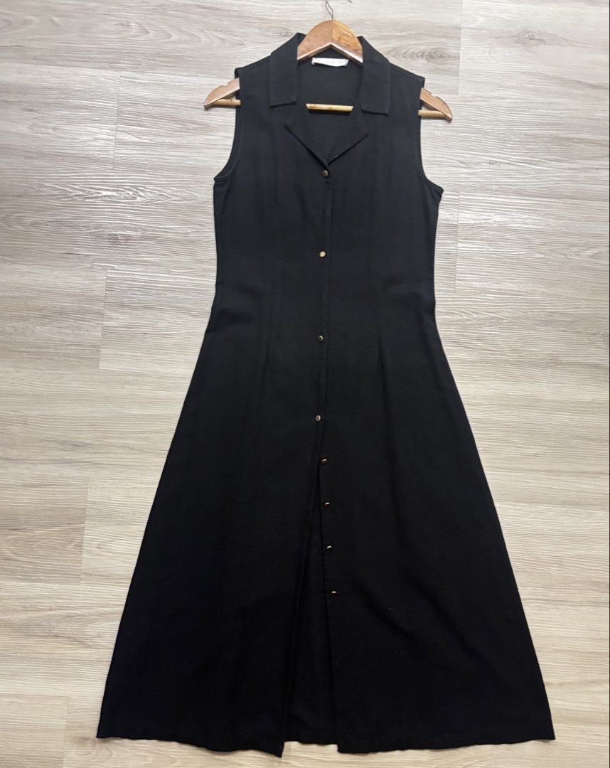 MNG Mango Black Sleeveless Button-Down Maxi Dress Size S (Category: Dresses) located in Manila. Submitted by .momi (Listing ID 1466790420, Image 1). Description: - Linen, classic lapel collar, gold button-down closure, fitted waist, maxi length - Versatile for casual wear or office styling.