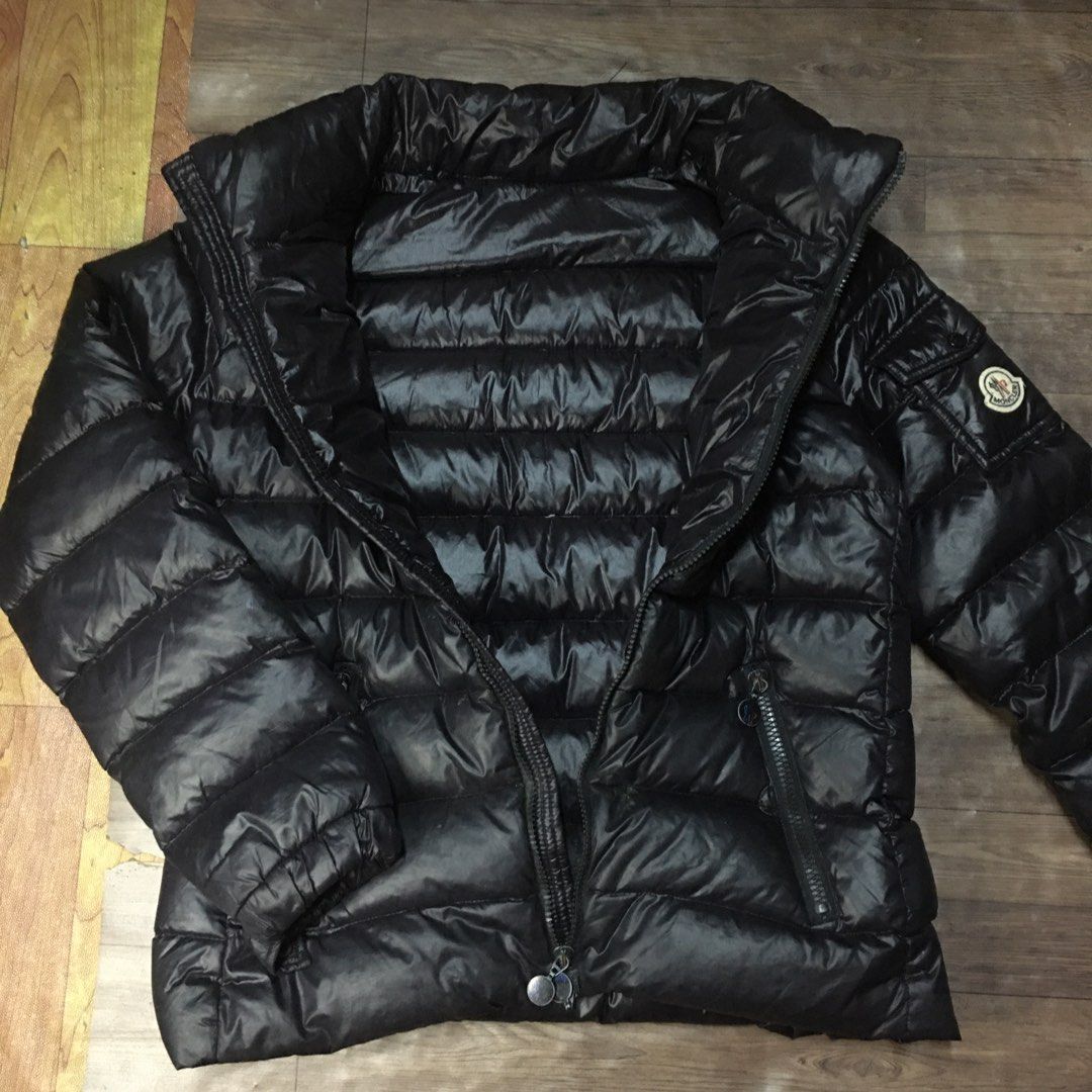 Moncler Black Puffer Jacket Down Coat (Category: Coats, Jackets and Outerwear) located in Zamboanga. Submitted by yuriwantscreampie (Listing ID 1466874238, Image 2). Description: - Brand: Moncler - Color: Black (Shiny finish) - Material: Down-filled (Warm & lightweight) - Features: High collar, full zip closure, dual front zipped pockets, sleeve pocket with signature logo patch - Fit: Elasticated cuffs and hem to trap warmth - Condition: Excellen