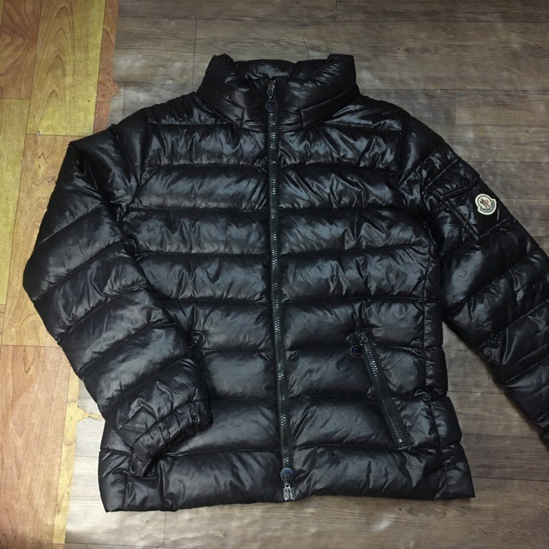 Moncler Black Puffer Jacket Down Coat (Category: Coats, Jackets and Outerwear) located in Zamboanga. Submitted by yuriwantscreampie (Listing ID 1466874238, Image 1). Description: - Brand: Moncler - Color: Black (Shiny finish) - Material: Down-filled (Warm & lightweight) - Features: High collar, full zip closure, dual front zipped pockets, sleeve pocket with signature logo patch - Fit: Elasticated cuffs and hem to trap warmth - Condition: Excellen