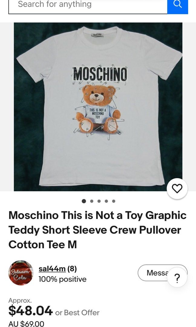 MOSCHINO SHORT SLEEVE CREW PULL OVER COTTON TEE (Category: Shirts) located in General Mariano Alvarez. Submitted by adonid (Listing ID 1466788781, Image 2). Description: MOSCHINO SHORT SLEEVE CREW PULL OVER COTTON TEE GOOD CONDITION NORMAL SIGN OF USAGE ONLY W40 L27.