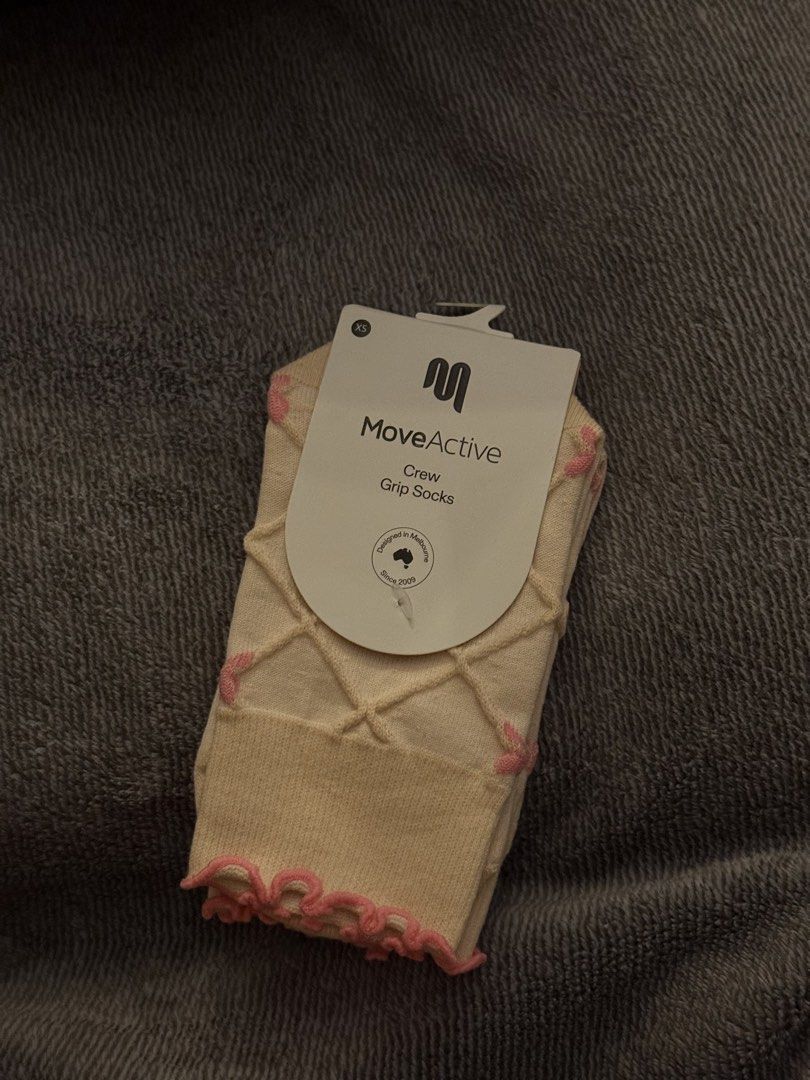 MoveActive Crew Grip Socks - Lattice Oat XS (Category: Socks & Tights) located in Pasay City. Submitted by andreaflo (Listing ID 1466919867, Image 1). Description: 🎀 BRAND NEW with original tag 🎀 Size: XS (USW 4-6); (not available in the PH!!!!) 🎀 Cream with pink details, diamond knit leg pattern, ruffle trim cuff with tiny pink bows 🎀 Non-slip grips on the bottom for stability 🧦 ideal for pilates, barre, and yoga studios.