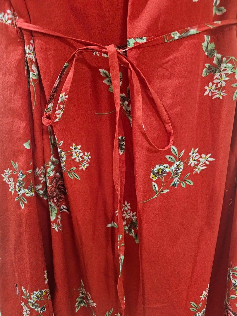 M&S Floral Red Wrap Dress plus size (Category: Dresses) located in Santo Tomas. Submitted by buybugs (Listing ID 1466964024, Image 3). Description: - Condition:Like brand new - Color/Pattern: Red with an all-over floral print - Design: Flattering wrap style with a V-neckline and short flutter sleeves - Details: Adjustable tie detail at the waist, -Usage: Summer dress, beach cover up, Brunch dress -Make: Cotton Polyester non-stretch.