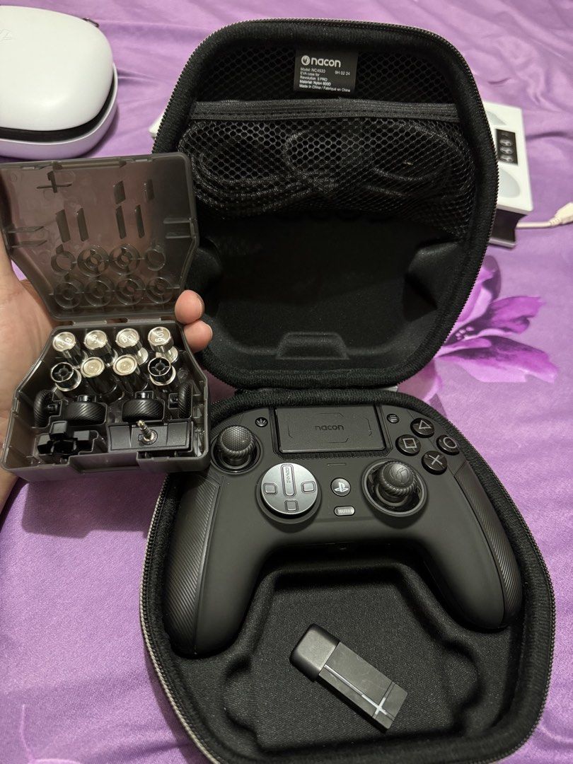 Nacon Revolution 5 Pro Wireless PS5 / PS4 / PC Controller – Black (Category: Controllers) located in Taguig. Submitted by coolforest_006216 (Listing ID 1466809247, Image 1). Description: Original Nacon Revolution 5 Pro premium wireless gaming controller. Compatible with PS5, PS4 and PC. Features Hall Effect joysticks, customizable controls, and interchangeable accessories. Includes controller, original carrying case, USB wireless dongle, and acce