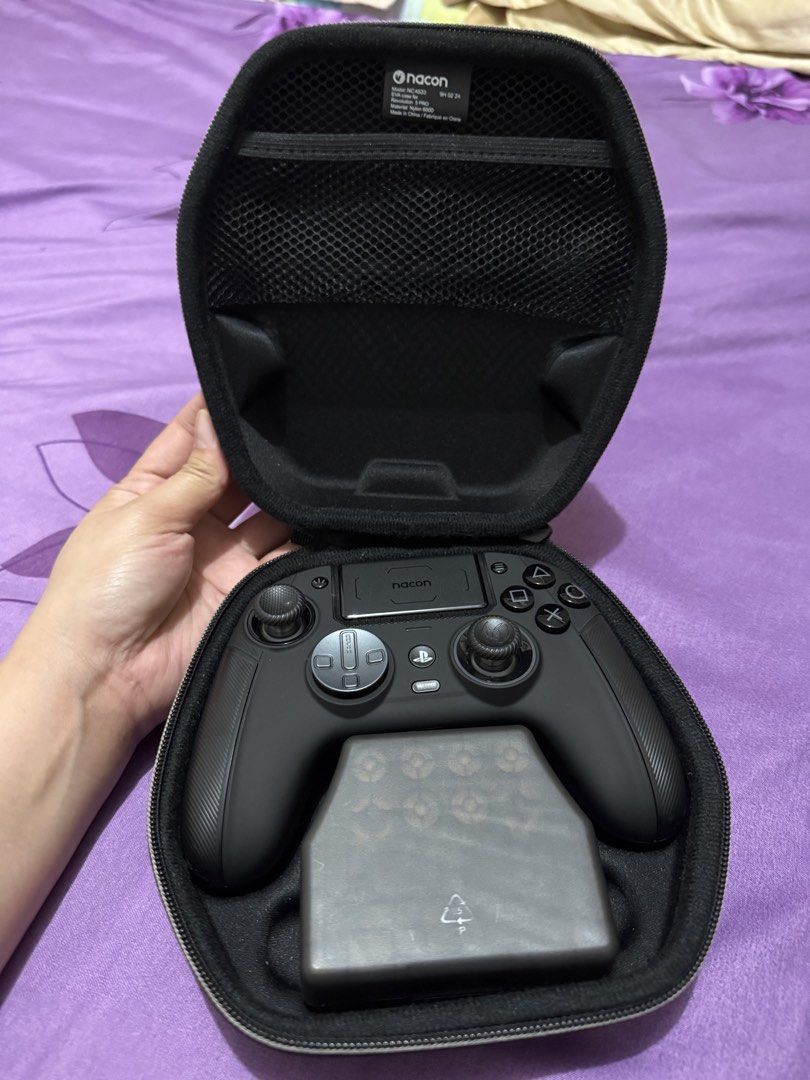 Nacon Revolution 5 Pro Wireless PS5 / PS4 / PC Controller – Black (Category: Controllers) located in Taguig. Submitted by coolforest_006216 (Listing ID 1466809247, Image 3). Description: Original Nacon Revolution 5 Pro premium wireless gaming controller. Compatible with PS5, PS4 and PC. Features Hall Effect joysticks, customizable controls, and interchangeable accessories. Includes controller, original carrying case, USB wireless dongle, and acce