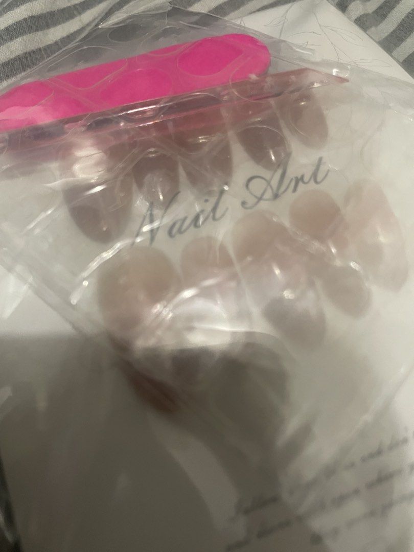 Handmade Press On Nails Size XS Php150 or it’s FREE (Category: Hands & Nails) located in Quezon City. Submitted by ladydianne8 (Listing ID 1466812867, Image 3). Description: - Size: XS (10 pieces total) - Design: Elegant nude pink with subtle shimmer and thin silver line accents - Packaging: Comes in secure, protective packaging - Benefits: Quick and easy at-home application, no salon visit needed - Condition: Brand new and ready to wear - Includ