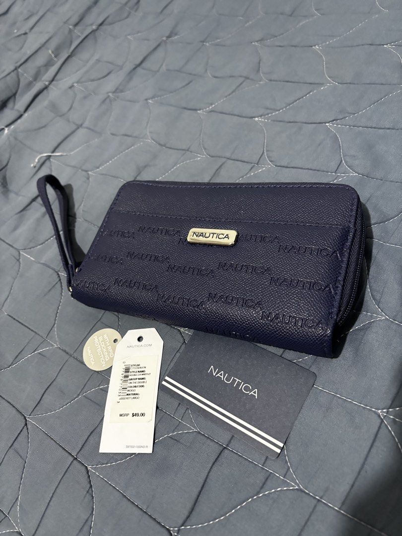 Nautica Wristlet Wallet (Category: Wallets & Card holders) located in Manila. Submitted by declutter_byjaq (Listing ID 1466938639, Image 1). Description: NAUTICA WRISTLET WALLET Details: Brand: Nautica Condition: Brand New Origin: US 🇺🇸 Brand new and unused! Nakatago lang sa cabinet kaya letting this go to someone who can use it. 🥰 RFS: Nakatago lang sa cabinet and needs cash.