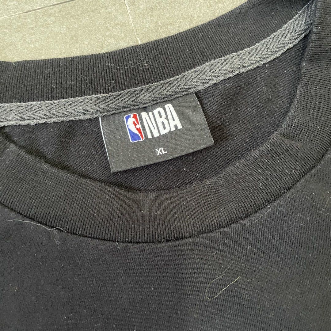 NBA Chicago Bulls Shirt (Category: Tshirts & Polo Shirts ) located in Mabalacat. Submitted by goldengarms_ (Listing ID 1466875036, Image 2). Description: Color: Black Size: XL on tag Condition: Excellent Color rate: 9.5/10 or better Issue: N/A Price is still negotiable for sure buyer 👍 - Payment thru GCash, Maya or Security Bank 💳 - Shipping via J&T Express 🛩️ Pm us for more details. Thank you! 📩.