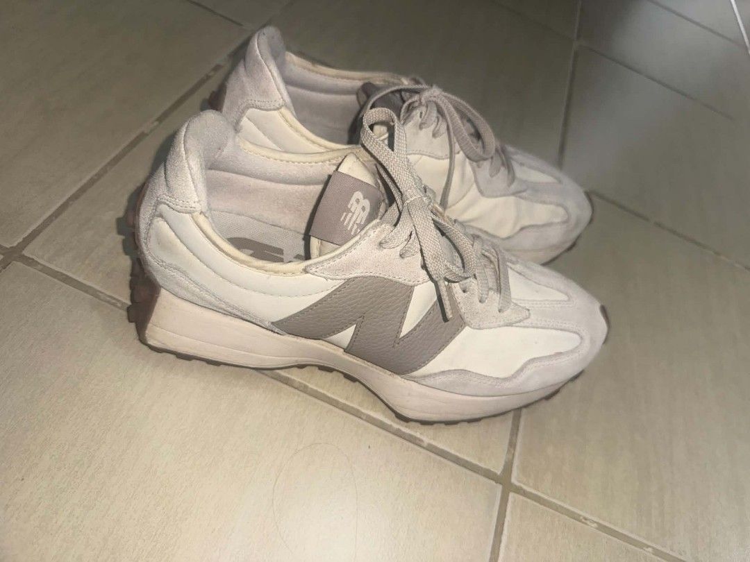 New Balance 327 Beige (Category: Sneakers) located in Manila. Submitted by aly.arca (Listing ID 1466865207, Image 1). Description: New balance 327 beige size US women’s 8.5/ 25.5cm - needs cleaning - Brand: New Balance - Model: 327 - Color: Off-white and grey suede - Features: Oversized N logo, chunky rubber waffle outsole, padded collar and tongue - Condition: Pre-owned with normal signs of wear on uppers and midsoles - Style: Versatile neutral 
