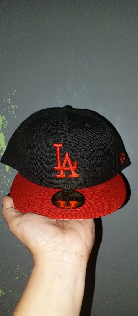 New Era 59FIFTY Los Angeles Dodgers Caps Bundle (Category: Caps & Hats) located in Manila. Submitted by saintruinu58681 (Listing ID 1466810979, Image 2). Description: Set of 2 New Era 59FIFTY fitted hats - Size: 8 - Colors: Blue with white LA logo & Black with red LA logo - Style: Flat brim with gold sticker and structured crown - Details: Clean front embroidery and side New Era flag logo - Condition: Brand new.