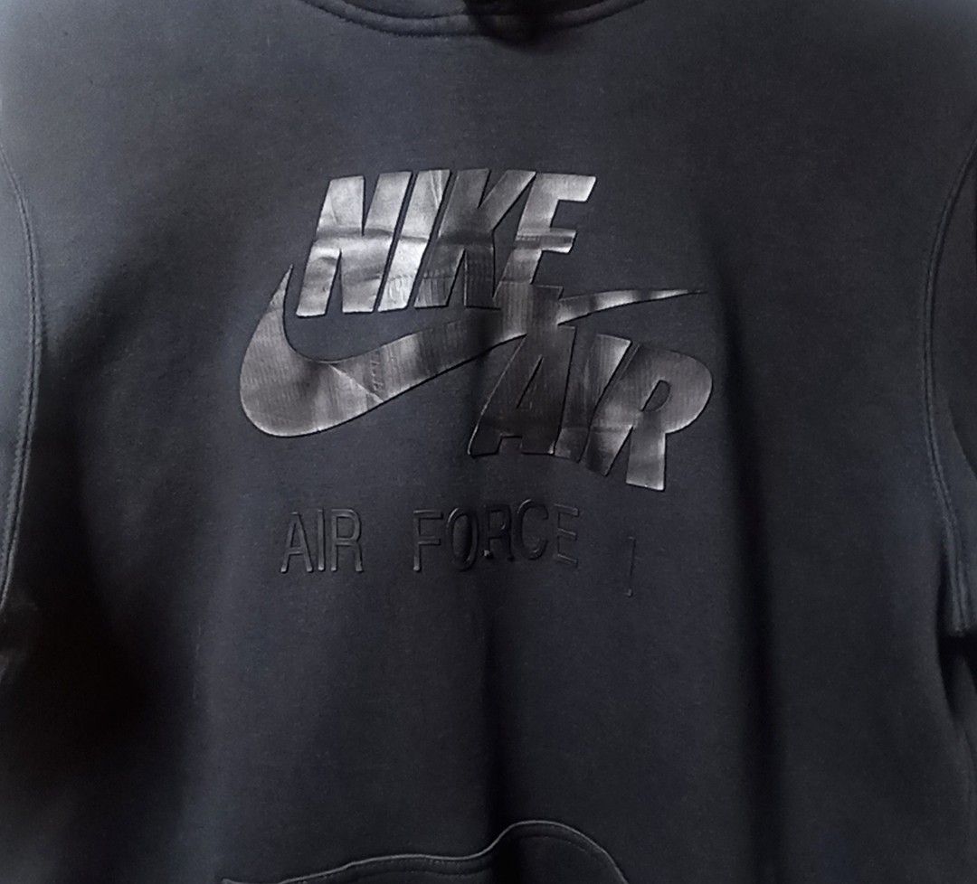 Nike Air Force 1 Hoodie (Category: Coats, Jackets and Outerwear) located in Kawit. Submitted by deidzdzn (Listing ID 1466831475, Image 3). Description: - Brand: Nike - Style: Air Force 1 Graphic Hoodie - Color: Black - Size: Tagged Medium, fits like Large - Measurements: 23 inches wide x 27 inches long - Design: Large front graphic with AF1 text, plus text graphic printed across the upper back near the hood and stars on sleeves..