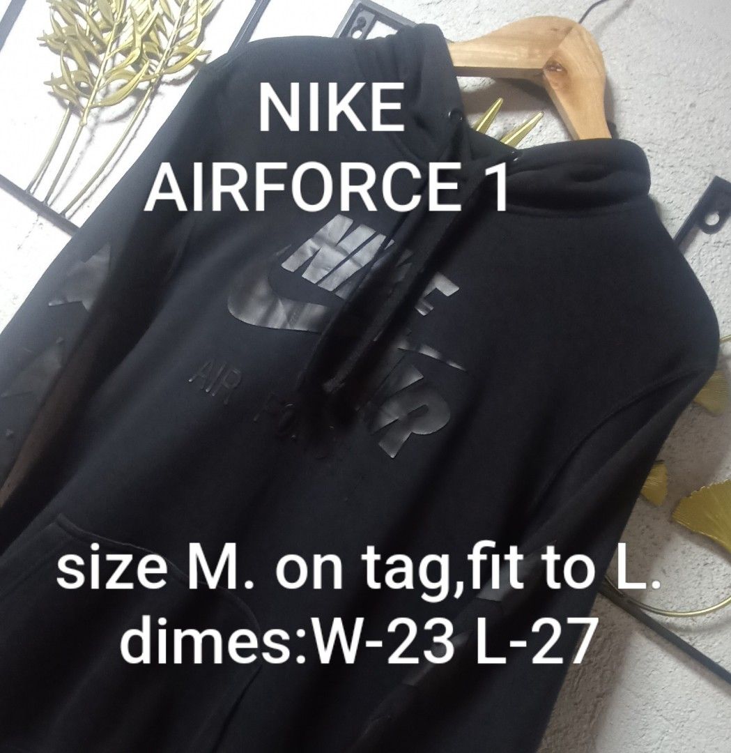 Nike Air Force 1 Hoodie (Category: Coats, Jackets and Outerwear) located in Kawit. Submitted by deidzdzn (Listing ID 1466831475, Image 1). Description: - Brand: Nike - Style: Air Force 1 Graphic Hoodie - Color: Black - Size: Tagged Medium, fits like Large - Measurements: 23 inches wide x 27 inches long - Design: Large front graphic with AF1 text, plus text graphic printed across the upper back near the hood and stars on sleeves..