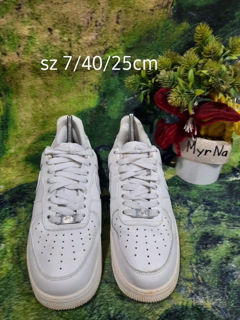 Nike Air Force 1 White Low Size 7 (Category: Sneakers) located in Baguio. Submitted by klayblakeb87803 (Listing ID 1466968220, Image 1). Description: - Brand: Nike Air Force 1 Low - Color: Classic White - Size: US 7 / EUR 40 / 25cm - Material: Leather upper with perforated toe box & chunky rubber sole - Details: Silver AF1 lace dubraes - Condition: Overall clean shape with solid tread; minor signs of wear on midsoles and laces.