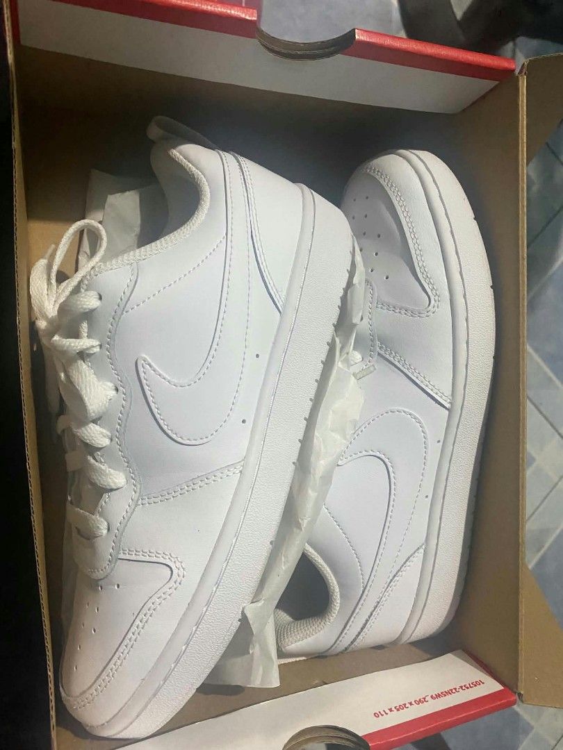 Nike Air Force 1 White Sneakers Size US 7 (Category: Activewear) located in Manila. Submitted by rhannieba (Listing ID 1466796919, Image 3). Description: - Brand: Nike - Style: Low-top, lace-up with perforated toe box - Condition: Brand new, never worn, d pristine inside and out (includes original box) - Size: US 7 / UK 6 / EUR 40 - Color: Classic clean white - Perfect for your daily rotation! 3500 dalawa.