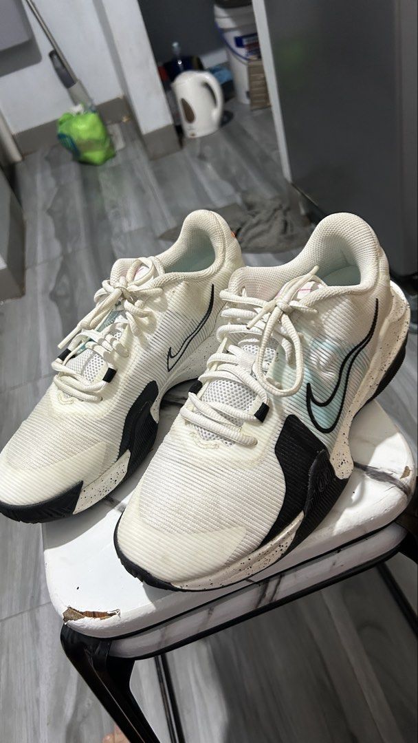 Nike Air Max Impact 4 White Copa Black (Category: Sneakers) located in Manila. Submitted by mendricklibiran (Listing ID 1466870123, Image 2). Description: Nike Air Max Impact 4 basketball shoes. White upper with black and copa accents plus speckled midsoles. Model code DM1124-101. Standard lace-up design with visible Air Max cushioning in the heel. Worn a few times, still plenty of grip left on the soles. Upper fabric shows light dust from indoor