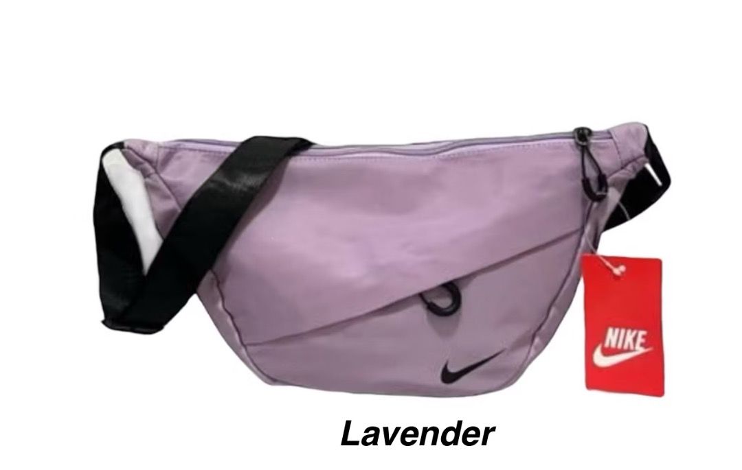 Nike Body Bag Unisex (Category: Cross-body Bags) located in Caloocan City. Submitted by crateandbarrel (Listing ID 1466820264, Image 1). Description: Nike Body Bag Unisex Color: lavender Size : 10 inches ships same day .