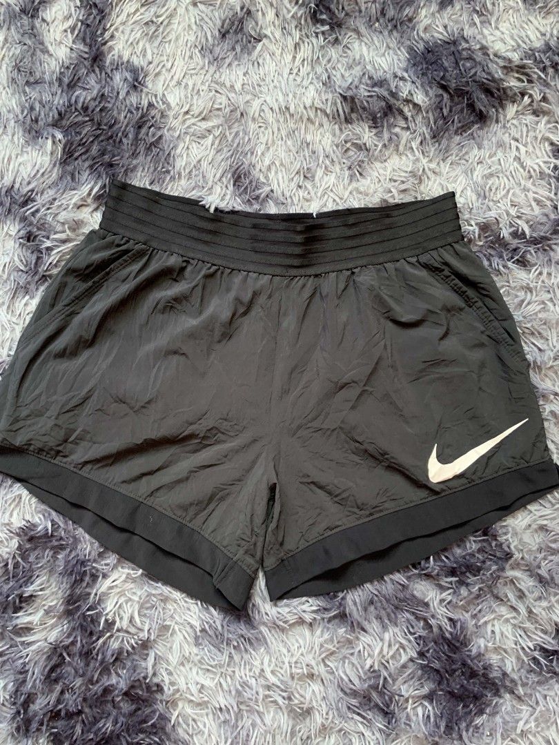 Nike Dri-FIT Black Athletic Shorts Size M (Category: Shorts) located in Pagadian. Submitted by duskthrift (Listing ID 1466855928, Image 1). Description: - Brand: Nike - Item: Dri-FIT Athletic Shorts - Color: Black with white swoosh logo on left leg - Size: Medium (M) - Material: Lightweight, sweat-wicking fabric - Features: Wide ribbed waistband for extra comfort - Condition: Great for workouts, running, and casual wear - Origin: Made in Vietnam 