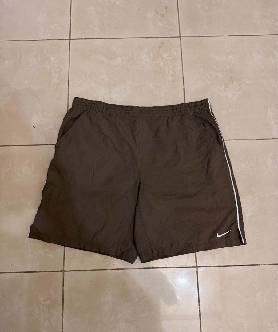 Nike Dri-Fit Brown Athletic Shorts (Category: Shorts) located in Manila. Submitted by stmngo (Listing ID 1466915014, Image 1). Description: Large on tag Adjustable Waistline 34-40 inches 19.5 inches Length 13.5 inches Leg Opening Excellent Condition.