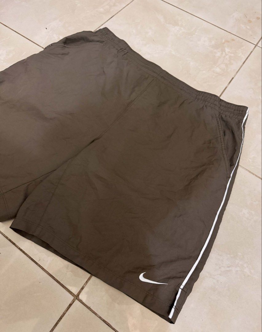 Nike Dri-Fit Brown Athletic Shorts (Category: Shorts) located in Manila. Submitted by stmngo (Listing ID 1466915014, Image 2). Description: Large on tag Adjustable Waistline 34-40 inches 19.5 inches Length 13.5 inches Leg Opening Excellent Condition.