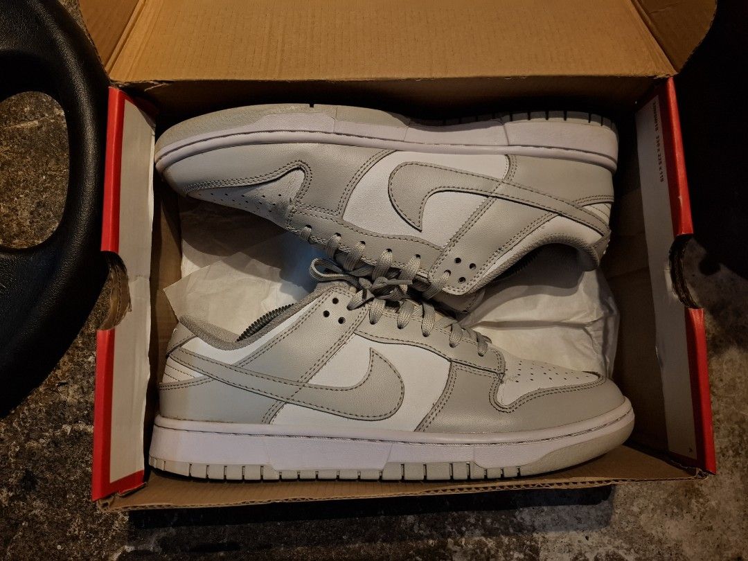Nike Dunk Low Grey Fog Sneakers (Category: Sneakers) located in Malabon City. Submitted by cmmdc93 (Listing ID 1466864604, Image 2). Description: - Model: Nike Dunk Low Grey Fog - Colorway: White / Light Grey - Condition: Clean uppers, crisp stitching, with minimal toe box creasing from handling - Inclusion: Original box included - Highlights: Classic versatile design, perfect for your daily rotation.