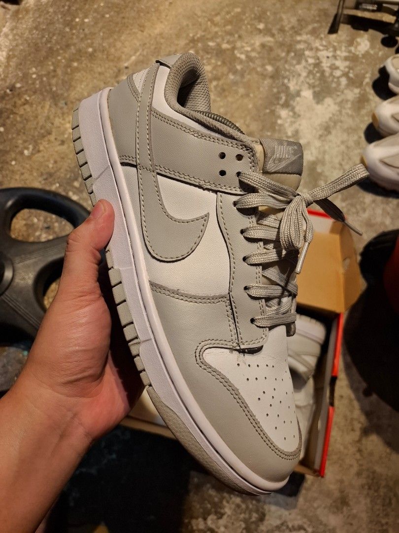 Nike Dunk Low Grey Fog Sneakers (Category: Sneakers) located in Malabon City. Submitted by cmmdc93 (Listing ID 1466864604, Image 1). Description: - Model: Nike Dunk Low Grey Fog - Colorway: White / Light Grey - Condition: Clean uppers, crisp stitching, with minimal toe box creasing from handling - Inclusion: Original box included - Highlights: Classic versatile design, perfect for your daily rotation.