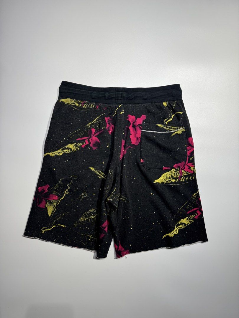Nike Floral Print Drawstring Shorts Black Size S (Category: Shorts) located in Cavite. Submitted by dracokidstuff (Listing ID 1466838267, Image 2). Description: - Brand: Nike - Size: Small - Color/Pattern: Black with all-over pink and yellow floral print - Details: Neon green drawstring, matching neon Nike swoosh on left leg, trendy raw edge hem - Pockets: Convenient side pockets and one back pocket - Material: Soft cotton, rayon, and polyester b