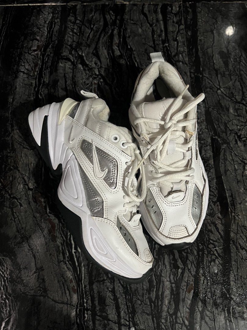 Nike M2K Tekno White Silver (Category: Sneakers) located in Oroquieta. Submitted by zjstg (Listing ID 1466859261, Image 2). Description: White and metallic silver chunky sneakers from Nike. Classic dad shoe silhouette with thick black and white soles. Laces included. Bottom treads have minimal wear. Great everyday casual sneakers with plenty of support..