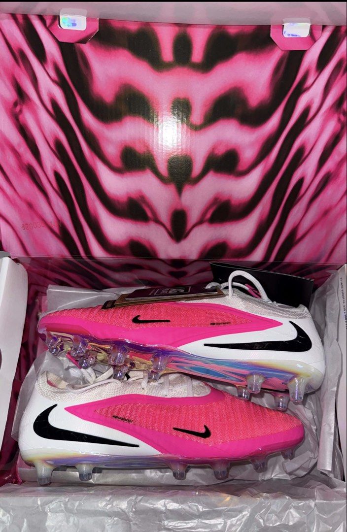 Nike Phantom 6 Low Elite AG-PRO T Multi-Color/Black (Category: Activewear) located in Taguig. Submitted by hazeltanb (Listing ID 1466967546, Image 1). Description: - Model: Nike Phantom 6 Low Elite AG-PRO T - Colorway: Multi-color and black with bright pink and white accents - Size: US Men 7.5 / UK 6.5 / EUR 40.5 / CM 25.5 (Also fits US Women 9) - Soleplate: AG-PRO designed specifically for artificial grass pitches - Condition: Brand new with tag