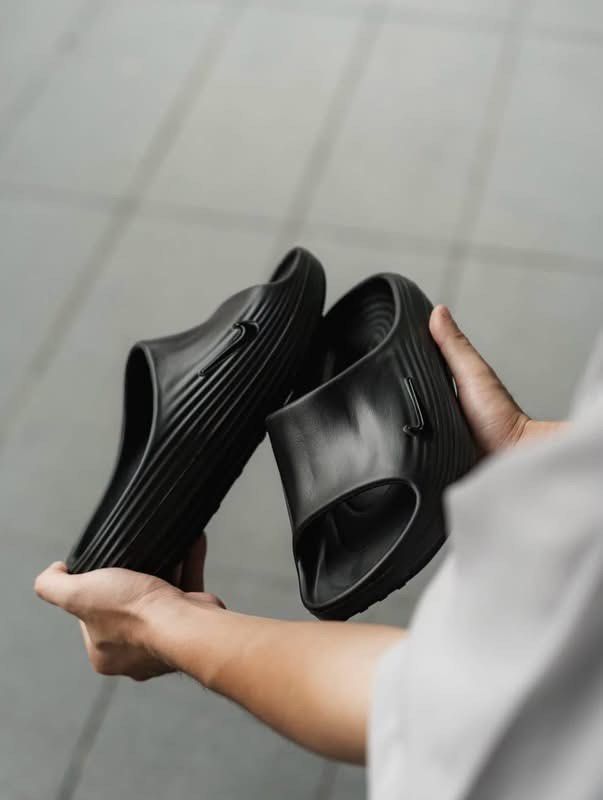 Nike ReactX Rejuven8 Slide ‘Black’ (Category: Slippers & Slides) located in Manila. Submitted by collectorfinds (Listing ID 1466890330, Image 3). Description: “DARK BY DESIGN. DYNAMIC BY NATURE.”🖤⚡️ Nike ReactX Rejuven8 Slide ‘Black’ Men’s US Size 8 ❌ Before ₱ 4,895 ✅ NOW ₱ 3,995 ONLY 📩 PM us to purchase 📍2nd Floor, 317 Fernando Poe Jr Ave . Quezon City. Right above Yamaha near LRT 1 - Roosevelt Station. 📈 Prices subject to change without not