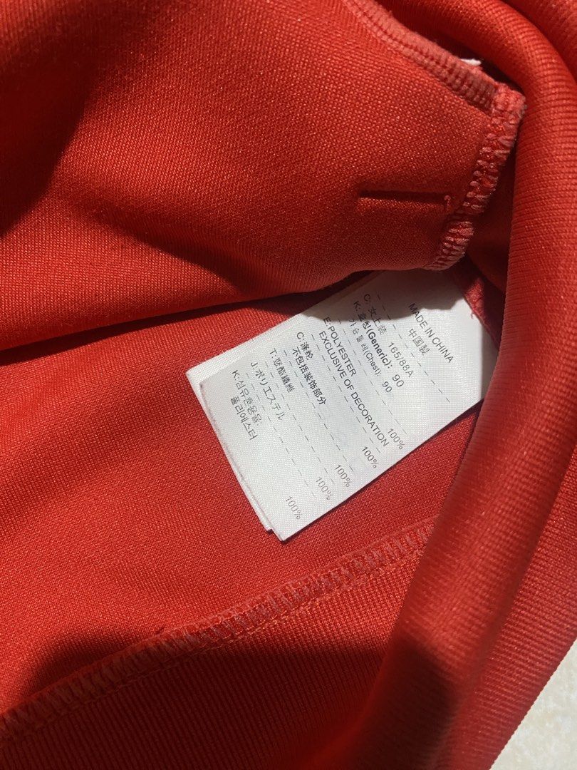 Nike Red Track Jacket (Category: Coats, Jackets and Outerwear) located in Manila. Submitted by wheeze_2208 (Listing ID 1466793424, Image 3). Description: Selling this Nike red track jacket with a white chevron design. Classic sporty look, full zipper, and front pockets. Perfect for casual outfits, streetwear, and everyday use. - Brand: Nike - Color: Red and White - Style: Track Jacket - Condition: Please see photos for actual condition. - Minor i