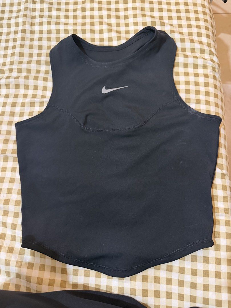 Nike Running Division Black Tank Top (Category: Activewear) located in Pasig City. Submitted by deedee235 (Listing ID 1466880934, Image 2). Description: RFS- impulse buy, fitted once and washed Negotiable.