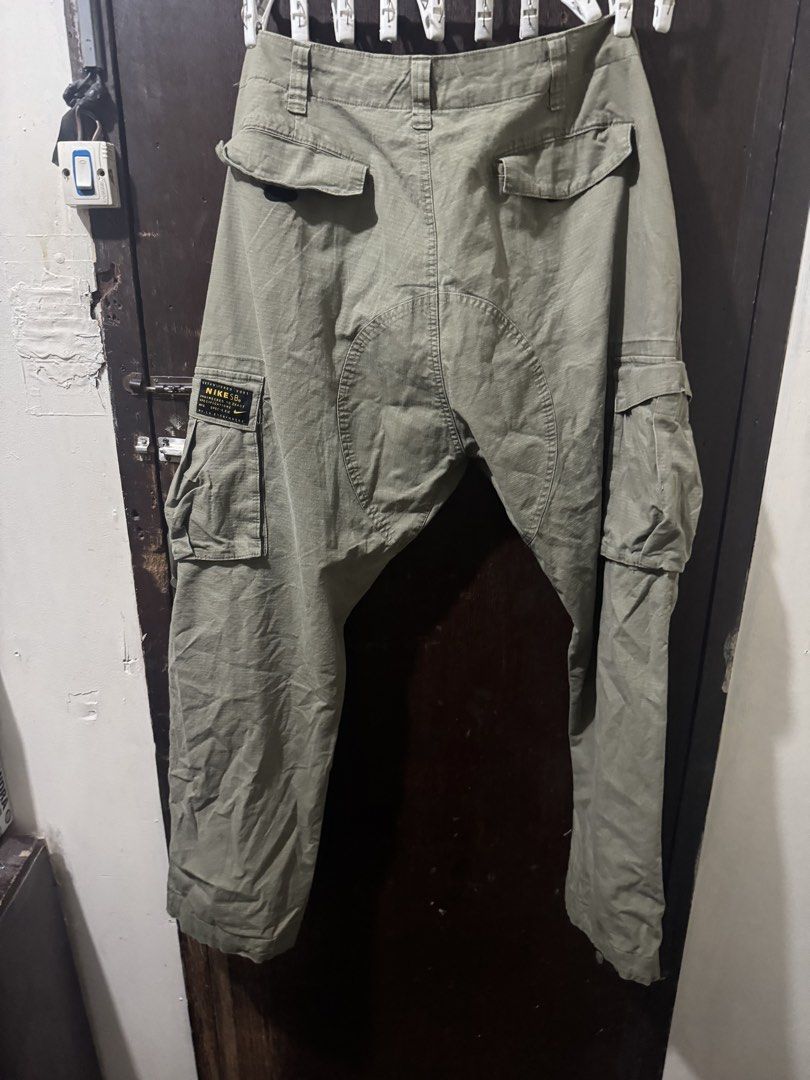 Nike SB Cargo Pants 38 waist width 40 length (Category: Joggers) located in Manila. Submitted by wiseearth.075b2f (Listing ID 1466887743, Image 3). Description: - Brand: Nike SB Cargo Pants -40 length 38 width waist -₱1975 - Color: Olive Green - Style Code: 916102-222 - Tag Size: 34 (Actual waist measures 36-37 inches) - Fit: Relaxed skate fit with reinforced panels - Material: Durable ripstop fabric - Features: Multiple utility pockets on sides 