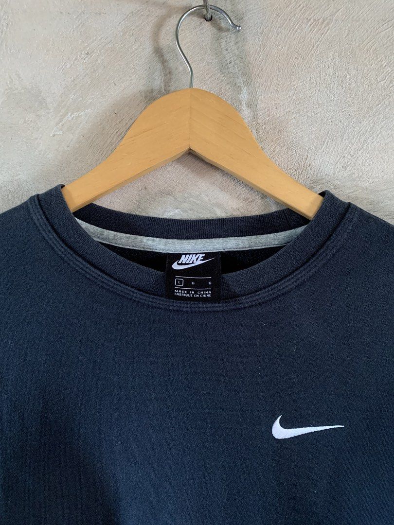 Nike side swoosh (Category: Activewear) located in Famy. Submitted by stuffxsogood. (Listing ID 1466856391, Image 2). Description: Nike sweater Large 22.5x26.5 Good fade.