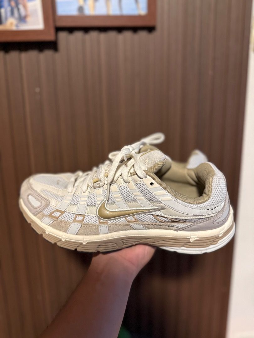 Nike V2K Run Sail Metallic Gold (Category: Sneakers) located in Molave. Submitted by thrifttashoe (Listing ID 1466879693, Image 1). Description: - Model: Nike V2K Run - Colorway: Sail and Metallic Gold - Size: US 9 / UK 8 - Style: Chunky retro runner with mesh panels and suede overlays - Features: Super comfortable midsole with durable black rubber outsole - Condition: Very clean with minimal wear on uppers and soles - Perfect for: Trendy daily b